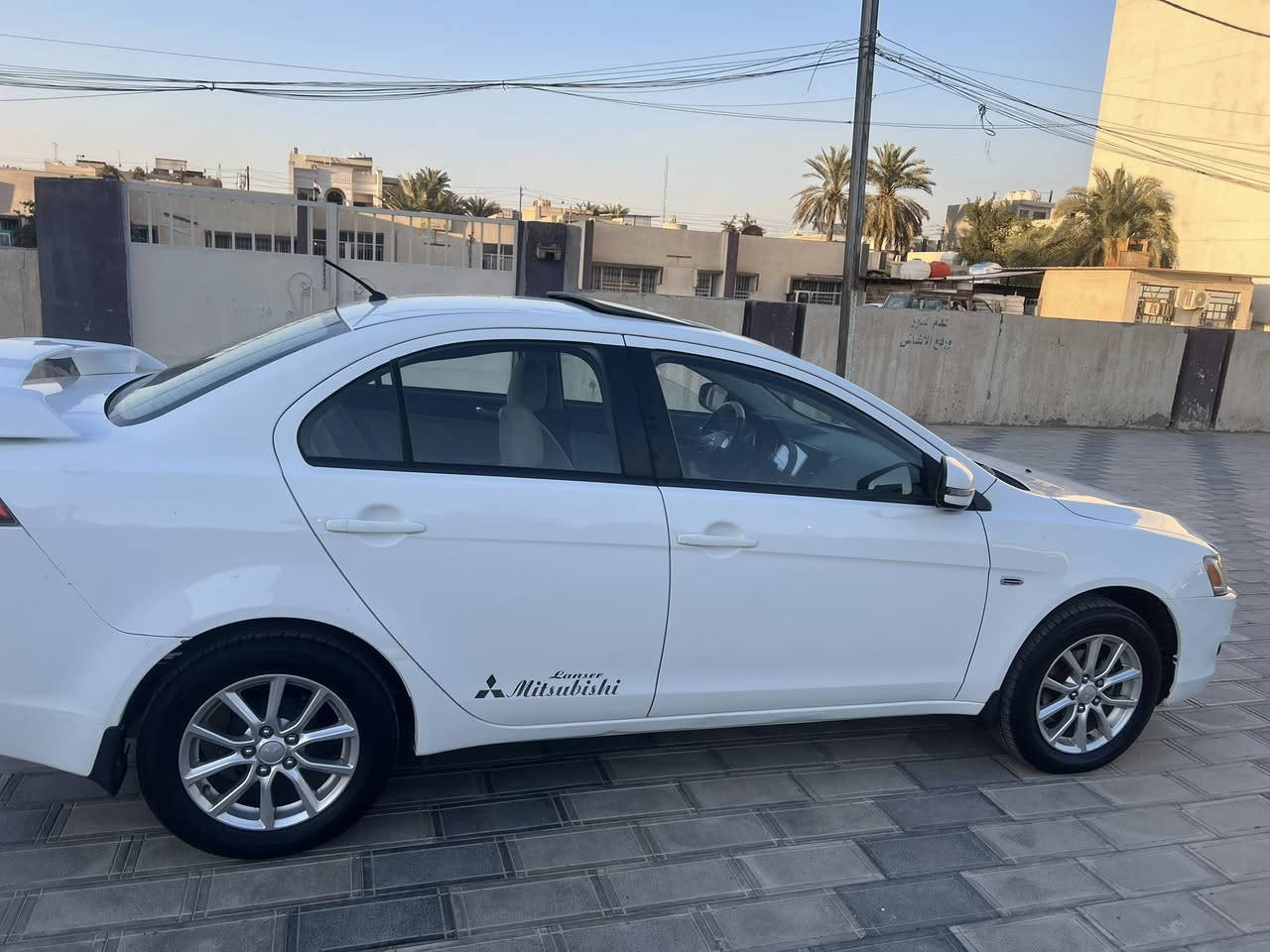 سلام عليكم لانسر قرش ٢٠١٦ جديدة سيارة ع ايدنة كير محرك صدر  تبريد ثلج مابيه اي. نقص اب اسمي رقم سنوية هزة جديدة سرفيس كامل مابيه اي شي نقص سيارة تجي وتشوف وتحكم تخم تاير جديد فتحة تحكم ستيرن مكاني بغداد حي جامعة رقمه حلو خليجي سيارة بيه صبغ باب وجاملغ وبيه كم حالوبة حتة سونار مسويله السعر ١٠٣ وبيه مجال بسيط ماشية ١٤٨ حقيقي سيارة احلة من صور ***********
