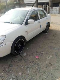 لانسر البيع شركة عامه مديل ٢٠١١ سياره جديده رقم بغداد الإنكليزي السيار...