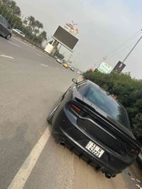 جارجر 2016 .RT 🚀محرك 5700 لون نفطي ماشيه 87 ميل السياره كير محرك مكفول...