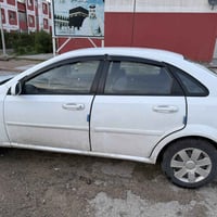 اوبترة 2011 باسمي بيها مكينة رايدها 65وبيها مجال 07728227860