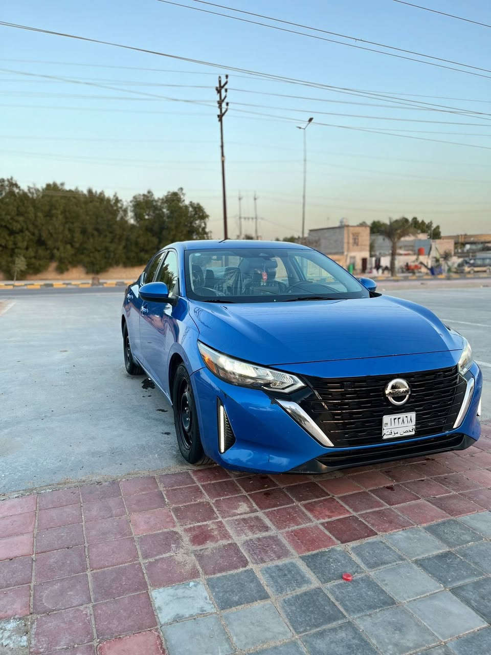 السلام عليكم ˛ يا الله
للبيع نيسان سنترا موديل 2024 وارد امريكي
العداد 50km بعدها زيرو السيارة 
رقم الشاصي 3N1AB8CV9RY298963

المواصفات: 
فئة SV لون ازرق جويتي المميز
بصمة تشغيل ،ودخول ذكي بصمة ابواب . 
رادار امامي وخلفي وجوانب. 
كاميرا خلفية دوار . 
حساسات. 
نقطة عمياء. 
مانع انزلاق. 
فول تحكم استيرن. 
نظام ECO. Sport. Normal
نظام توقف ذاتي . 
لايت led
شاشة تدعم carplay 
تحديد مسار
مثبت سرعة
محرك 2000cc
ومواصفات اخرى كثيرة. 

جميع إرباكات السيارة سليمة وبلادية. 
شاصي السيارة سليم 100%100 شرط الفحص. 

السيارة اني مستوردها ومصلحها بيدي تعتبر كلين تايتل فقط دعامية امامية شادلها بلادية مو تجاري

سيارة عَنْ تجربة شخصية بيها سلاسة بالقيادة وثبات بالشارع وصرفية بانزين ابدًا مابيها وبانزين عـاديّ بدون ﺎَيّ دوانز 

مبدل هايدروليك الكير ودهن المحرك من شركة امزويل وتايرات جدد

السيارة فحص مؤقت تترقم بغداد ﺎَو جميع المحافظات 

سعر 139$ انسب سعر بالسوك 

للاستفسار عن السيارة الاتصال على الرقم او مراسلة عن طريق الواتساب 
اتصال ***********
واتساب فقط ***********
