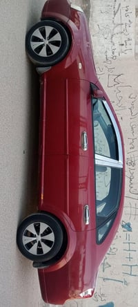 فورنزا 2006 گير ومحرك وتبريد جيد جدا بأسمي السعر 45 موبايل 07727623174