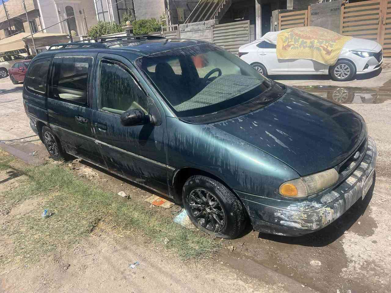 سياره فورد وند ستار موديل 98 رقم بغداد مشروع وطني سياره متروكه سياره بلاديه لا ضربه ولا صبغ مكاني بغداد السعر 28ورقه  الاتصال ***********
