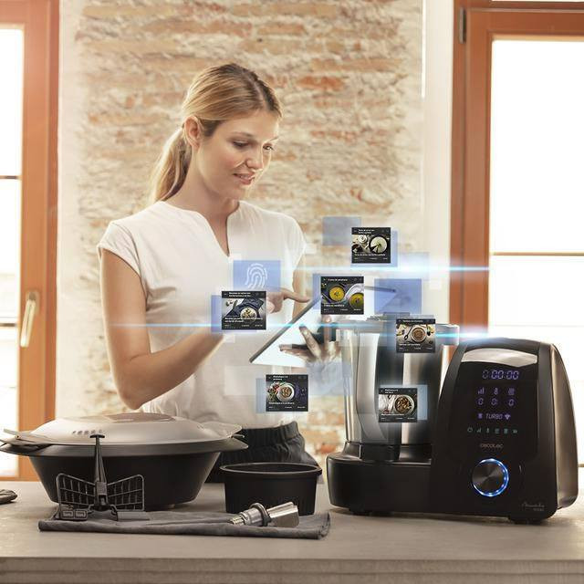 Mambo Touch، وهو روبوت طهي متعدد الوظائف من إنتاج شركة Cecotec الإسبانية. يتميز هذا الموديل بتصميمه المدمج وشاشته التي تعمل باللمس، وهو مصمم لتسهيل عملية الطبخ من خلال مجموعة واسعة من الوظائف الآلية.أبرز مميزات جهاز Mambo Touch:تعدد الوظائف: يتضمن الجهاز 37 وظيفة مختلفة، تشمل التقطيع، الطحن، العجن، الطبخ بالبخار، القلي، والطهي ببطء.شاشة تعمل باللمس: يحتوي على شاشة TFT مقاس 5 بوصات تتيح تصفح الوصفات والتحكم في الإعدادات بسهولة.الميزان المدمج: مزود بميزان عالي الدقة لوزن المكونات مباشرة داخل الوعاء.اتصال ذكي: يمكن ربطه بـ تطبيق Mambo على الهاتف المحمول للوصول إلى أكثر من 1000 وصفة ومتابعة عملية الطبخ عن بُعد.نظام OneClick: يسمح بتغيير الملحقات (مثل الشفرات أو ملعقة MamboMix) بسرعة وسهولة دون الحاجة لإزالة الوعاء.القوة والسعة: يعمل بمحرك قوته 1600 واط، ويأتي بوعاء من الفولاذ المقاوم للصدأ بسعة 3.3 لتر، وهو آمن للغسل في غسالة الأطباق.معلومات إضافية:السرعة والحرارة: يوفر 10 سرعات بالإضافة إلى "سرعة صفر" التي تسمح بالطهي بدون تحريك، مع إمكانية ضبط الحرارة بدقة من 37 إلى 120 درجة مئوية.الطهي المتعدد: يتيح طبخ ما يصل إلى 4 أطباق في وقت واحد باستخدام الوعاء، السلة، وجهاز البخار ذو المستويين.


**إذا كنت صاحب هذا الإعلان وتريد حذفه لأي سبب، رجاءا أرسل رسالة إلى الدعم الفني**