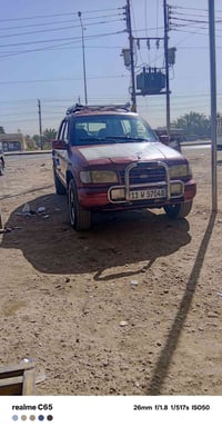 كيا سبورتج 1993 كير عادي مكفوله من الصبغ والحادث عطل كير فقط رقم بغداد...