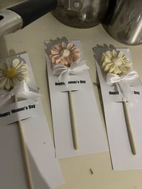 توزيعات شمع • يوم المرأة • زهرة الربيع