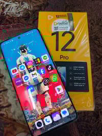 ريلمي 12 برو ٥١٢ • شاحن وباكيت • استخدام قليل