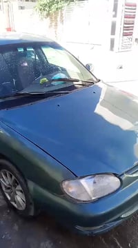 كيا سيفيا موديل 2000 للبيع رقم دولي جاري محرك عادي عرضه ب 30 وبيها مجا...