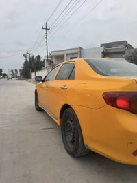 كورلاموديل2009 بسمي دفتر. بانزين ضرر جهة سائق. كامل الشراي يخابر. 0771...