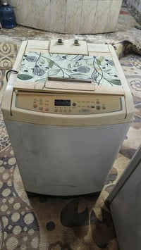 غسالة اوتوماتيك • نضيفه • نجف