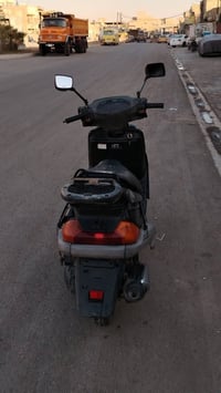 دراجه فضائي 100 للبيع فقط الكفر الامامي بي كسر مكاني مدينه الصدر للأست...