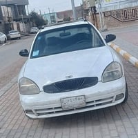 سياره دايو نوبرا رقم بغداد موديل ٢٠٠١ سنوي مجدده محرك 1600 تبريد عاطل ...