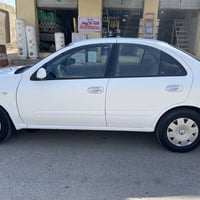 نيسان سني للبيع موديل 2010  كير ومحرك وصبغ مكفول  بارد  شبر تقريبا فقط...