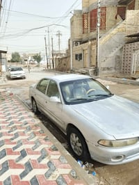 سيارة ميتسوبيشي ياباني  موديل 98  محور كورلا 1800 رقم بغداد  كير ومحرك...