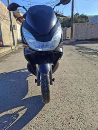 دراجه PCX  مكفولة محرك بجيس السعر 12 ورقة للاستفسار 07724573156
