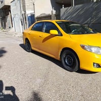 كورولا تاكسي 2010 رقم كركوك السياره كل شيء نظيف ضرر بس جاملخ شويه بوني...