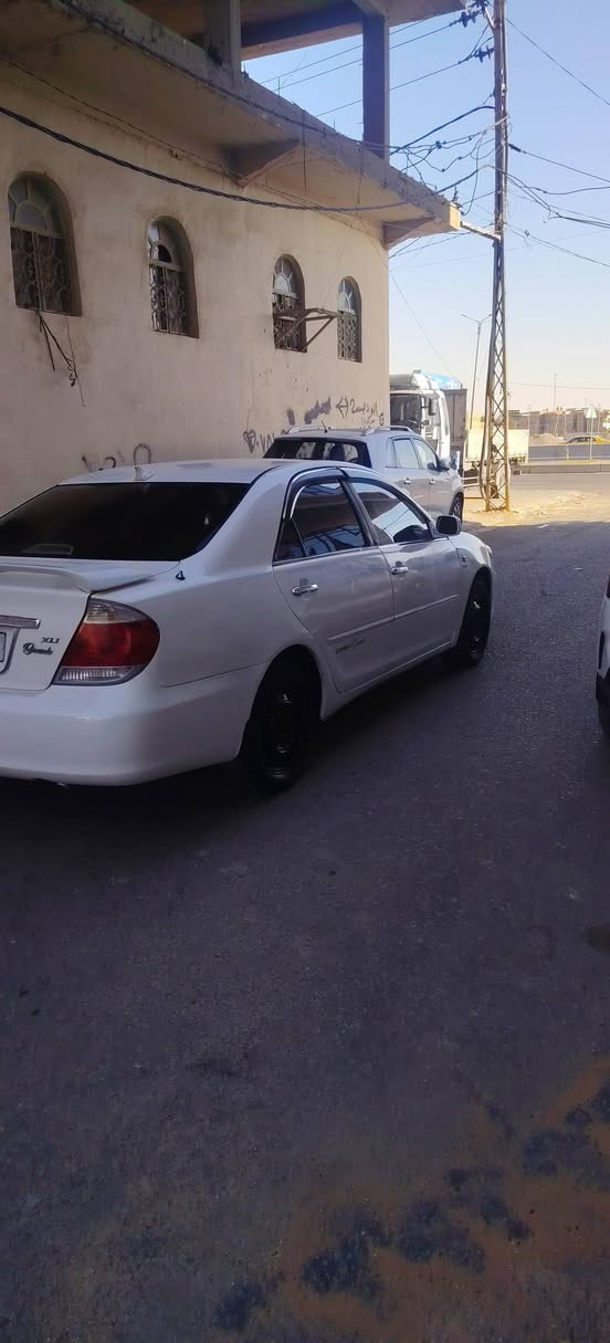 كامري ٢٠٠٦ بأسمي محرك ٢٤٠٠ جاهزة من كلشي صبغ حزام جمالية بدون حادث محرك وگير وتبريد وحداديه مكفولات السعر ٨٥ وبيه مجال بيع او مراوس حسب القناعه مكان السياره النجف للإستفسار ***********
