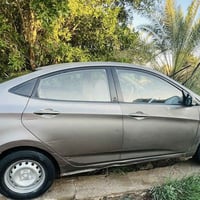 اكسنت موديل 2012سيارهً بيها باب مبدل وجاملغ راجع بارد وهاي طخه بلباب و...