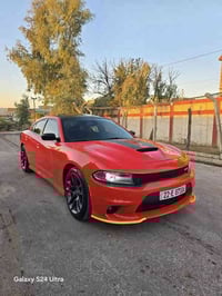 للبيع سعر 284$ دوج جارجر دايتونا هيمي 2021 ماشية 72 ألف لون مميز برتقا...