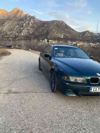 بي إم دبليو • ١٩٩٨ • عسلي