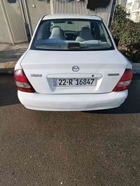 مازدا ٣٢٣ • موديل ٢٠٠٠ • بلا مشاكل