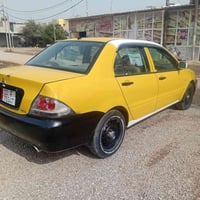 لانسر • ٢٠١٠ • كير عادي