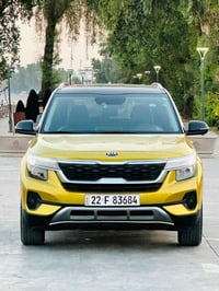 كيا سيلتوس 2021 لون ذهبي  محرك 2000 دوش ماشية 76 ميل  صور السونار موجو...