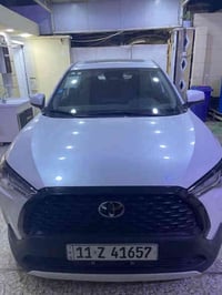 تويوتا كورلا كروس خليجي 2025 هايبرد عداد المسافه15 الف رقم بغداد بأسمي...