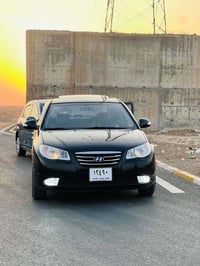 اڤانتي ٢٠١٠ • أسود • سقف سلايد