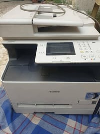 طابعة كانون • شغالة • احبار ملون