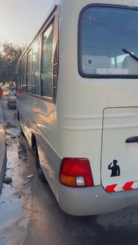 كوستر هونداي كاونتي  موديل 2001 بتره 25راكب  رقم بغداد أنكليزي مصفره ه...