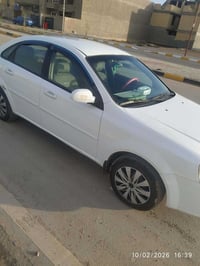 اوبترا شوفرليت ٢٠١١ بيها صبغ صفحة كاملة باقي مكفول ا السيارة بأسمي الس...