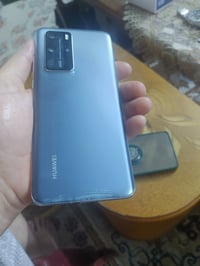 هواوي  P40 Pro ذاكره 256 ننيف جدا ماعدا الظهر من لاسفل ملحوم لانه جان ...