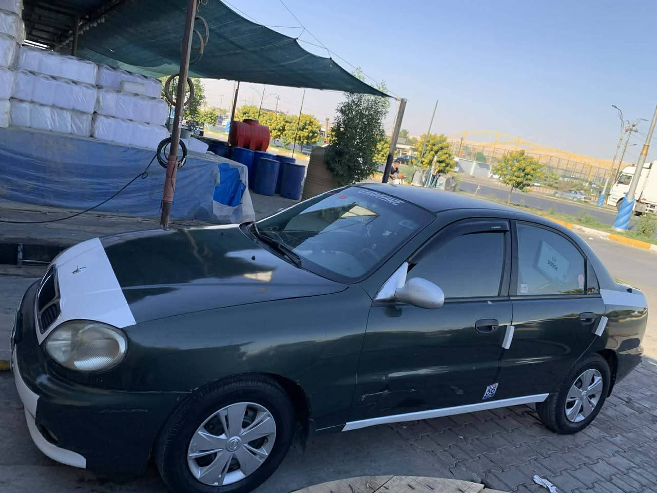 سياره دايو لانوس للبيع سعر٣٨ورقه بي مجال رقم م *********** سنويه لحد ٢٠٢٧
