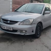 وبركاته لانسر موديل 2010 رقم كربلاء انكليزي تحويل ثاني يوم  تدفئه تبري...