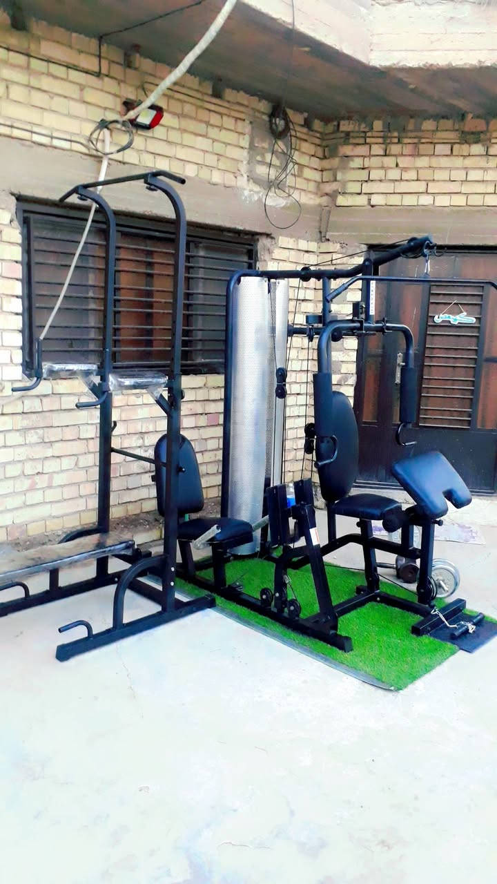 مولتي جم رباعي اصلي جديد متعدد التمارين مع الاوزان 300 بغداد الشعب ***********
