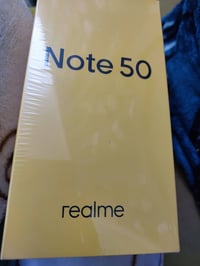 ريلمي نوت 50 • على اول تم