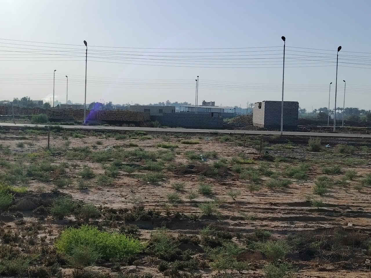 عرصة ١٠٠ متر للبيع الخدمات تبليط ماي كهربائ مقابل بازين خانة الشموس ***********
