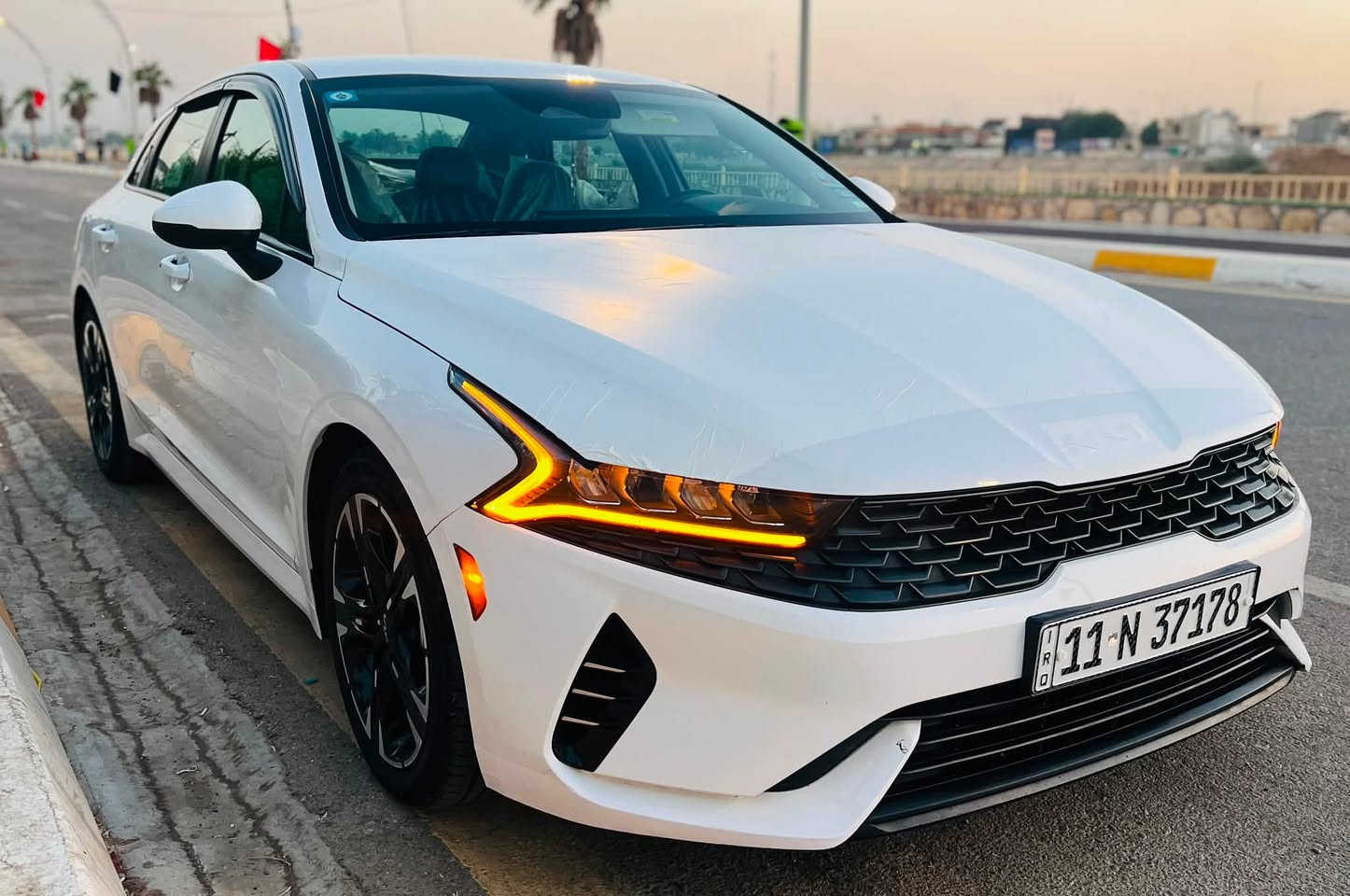 ‎🚘 للبيع Kia K5.   موديل.  2023
‎📍  رقم بغداد. باسمي تحويل ثاني يوم
‎📍 المكان: بغداد – حي الجهاد
‎✅ بدون حادث‎✅ 
بدون إيرباك فقط تقرير تسير وتعمل شرط اذا فيوز مبدل خسارلك الي تريده صور امريكا نزلتهن بل منشور

‎🎨 اللون: أبيض
‎🔥 محرك 1600 تيربو
‎جاهزه السياره من كل النواحي ومابيها نقص 
‎🌟 المواصفات
‎•
‎• ستيرن تدفئة
‎• تشغيل عن بعد
‎• بصمة + هاند بريك بصمة
‎• قيادة ذاتية على الخطوط السريعة
‎• مثبت سرعة /ماشيه. 54. الف مايل
• AUTO HOLD
‎• أوتو بريك
‎• كير أوتو + عادي

‎🛡️ أنظمة الأمان:
• ABS
‎• مانع انزلاق
‎• حساسات إطارات
‎• رادار أمامي وجانبي
‎• مراقبة النقطة العمياء
‎• رادار الخطوط البيضاء
‎• توقف ذاتي عند الرجوع

‎💡 الإضافات:
‎• لايتات 4 عدسات
• LED + زينون
‎• بك لايت LED
‎• مصابيح ضباب LED
‎• كامرة دوارة
‎• شاشة + شاشة أعطال
‎• نظام ملاحة (خريطة)
• Apple CarPlay / Android Auto لاسلكي
‎• بلوتوث + AUX + USB
‎• فول تحكم ستيرن
‎• أشاير بالمرايا

‎• أنظمة قيادة: Eco / Sport / Smart / Normal

بيها مكانين بارد فقط بدون صبغ كفاله
اخوان السوگ كلشي بي وبلتوفيق للجميع
رقم بغداد وهزه جديد باسمي تحويل ثاني يوم

‎💰 السعر:  172. $ دولار وبيها مجال  

‎📞 للاستفسار:***********
‎✅ متوفر واتساب
