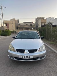لانسرموديل 2006 كيرمكينه تبريد سياره جاهزه برغي مناقصها  رقم بابل مميز...