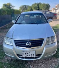 Nissan sunny 2011  ٤جام کارەبا شاشەئایپاد ناو فورمیکا گێڕ تۆماتیک نە ب...