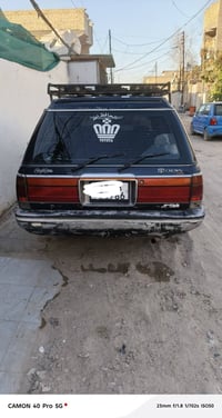 سياره استيشن سيدان رقم انكليزي سنويه تنتهي ٢٠٣١سياره باسمي بيها خيط تب...