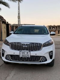 سورنتو 2019 ابيض ثلجي  وارد امريكي  4 سلندر،  7راكب  كامل مواصفات عده ...