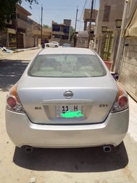 نيسان التيما خليجي موديل ٢٠٠٩ رقم بغداد انكليزي كير ومحرك مابيهم تنقيص...