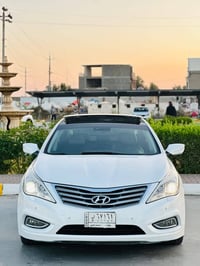 ازيرا ٢٠١٤ • فول مواصفات • رقم بغداد