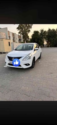 للبيع نيسان سني هندي  2024 ضمان شركة السور  ماشيه 12000 رقم بغداد إنكل...