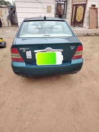 سياره كورله بيكاتشو موديل 2001 رقم بغداد انكليزي بسمي هزه جديده. تحويل...