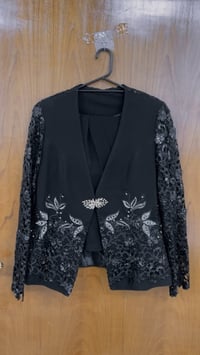 كوستم نسائي • مقاس ٤٢ • سواد فاحم