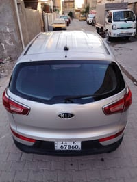 سبورتج موديل 2012 محرك  2400 ماشيه 25 الف فقط محرك وكير كفاله رقم بغدا...