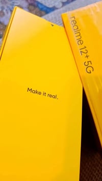 ريلمي • فايف جي • ٥١٢